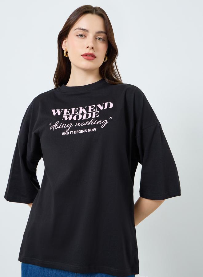 Styli Women Black Slogan Print T-Shirt - Image 1